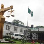 Woman, 34, docked over alleged assault, conspiracy
